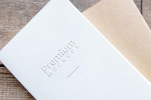 Load image into Gallery viewer, Free White Embossed Greeting Card Mockup

